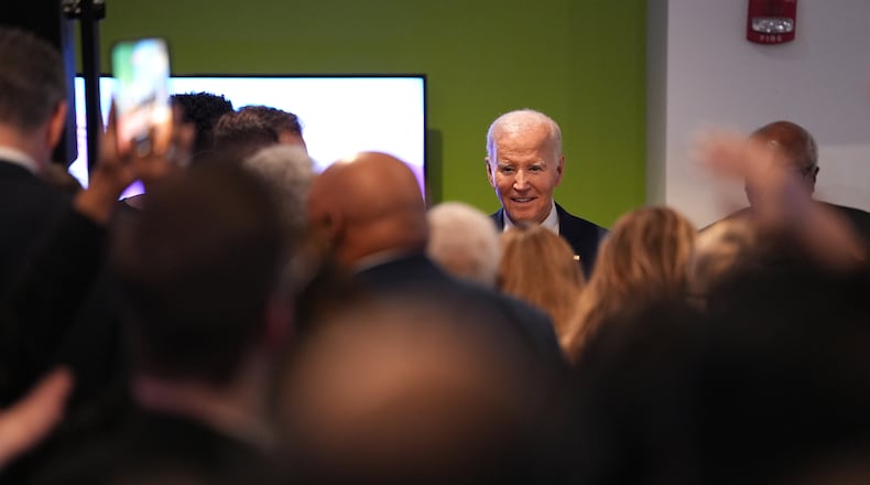 Former President Joe Biden interacts with the crowd after speaking to the South Carolina Democratic Party on Friday, Feb. 27, 2026, in Columbia, S.C. (AP Photo/Matt Kelley)