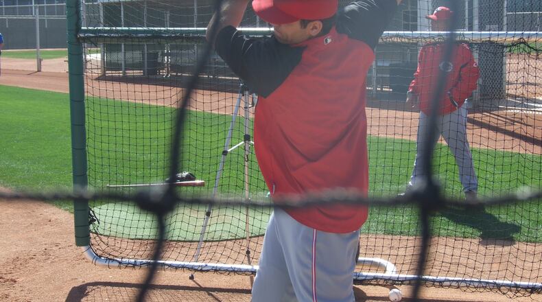 Joey Votto gets some swings during batting practice in Goodyear, Arizona.