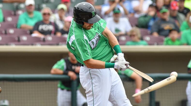 Taylor Sparks breaks his bat as he hits a pitch during the second inning of a Midwest League game against Lansing on Sunday afternoon at Fifth Third Field. Contributed Photo by Bryant Billing