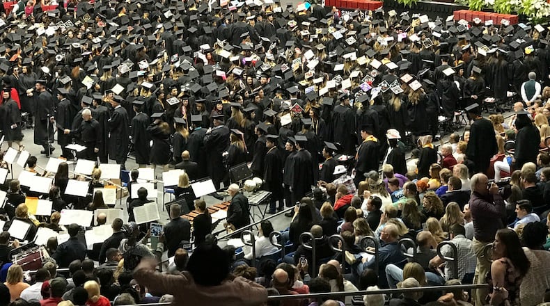 Sinclair Community College held its graduation ceremony on Sunday at UD Arena. Bill and Melinda Gates Foundation CEO Sue Desmond-Hellmann served as the commencement speaker for the event that awarded a record 4,600 degrees and certificates. STAFF
