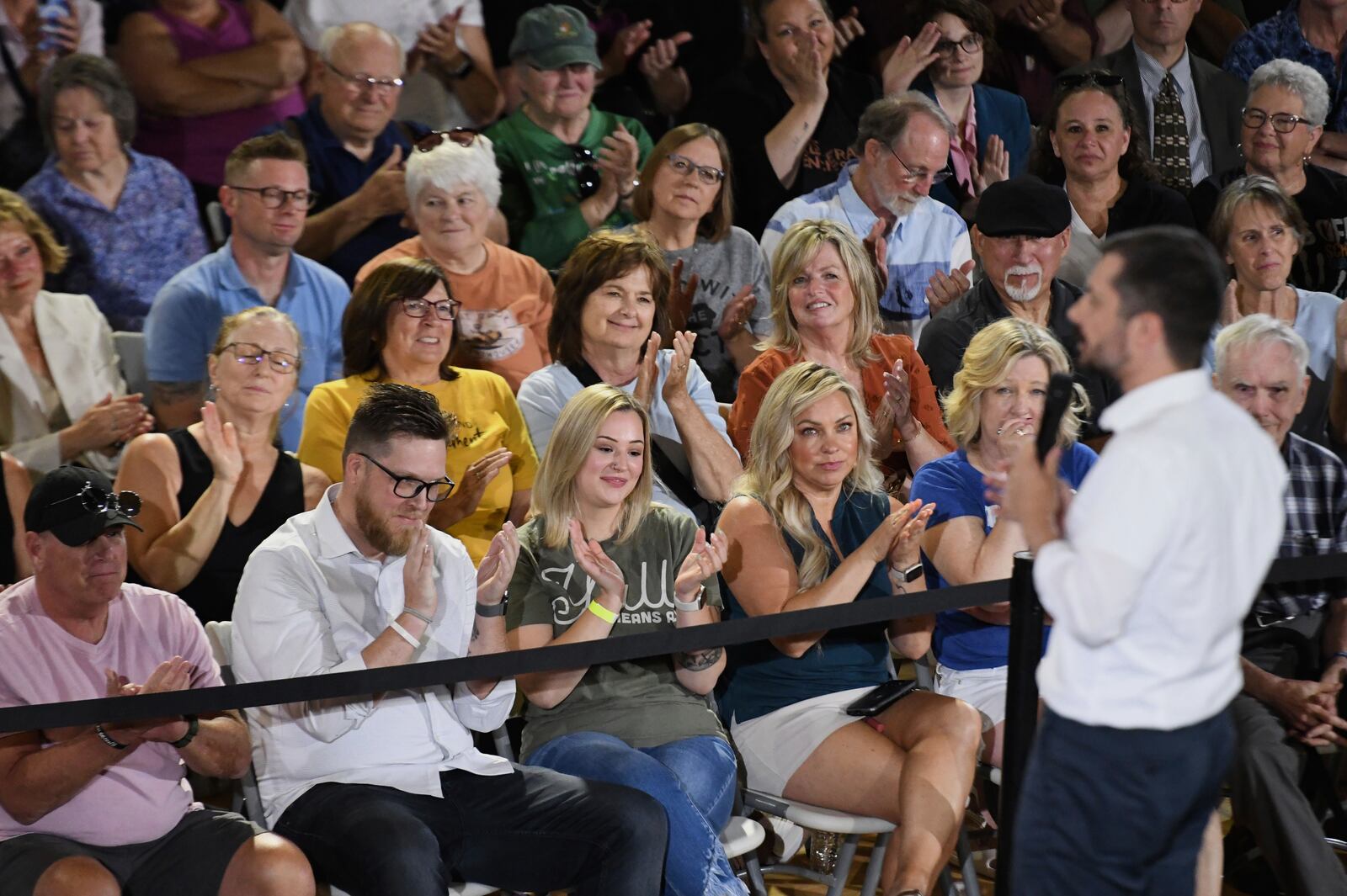 The audience applauds former U.S. Secretary of Transportation Pete Buttigieg during a VoteVets Town Hall, Tuesday, May 13, 2025, in Cedar Rapids, Iowa. (AP Photo/Cliff Jette)