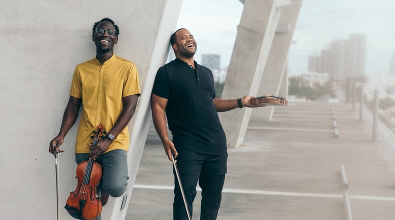 Kevin Kev Marcus Sylvester (right) and Wil B Baptiste of Black Violin, performing at the Schuster Center in Dayton on Tuesday, Nov. 5, is self-releasing their fourth album, Take the Stairs, on Friday, Nov. 1. CONTRIBUTED