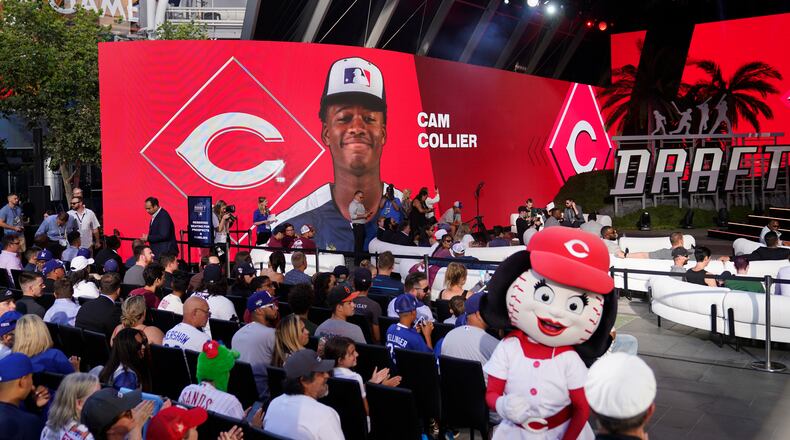 Cam Collier is selected by the Cincinnati Reds with the 18th pick of the 2022 MLB baseball draft, Sunday, July 17, 2022, in Los Angeles. (AP Photo/Jae C. Hong)
