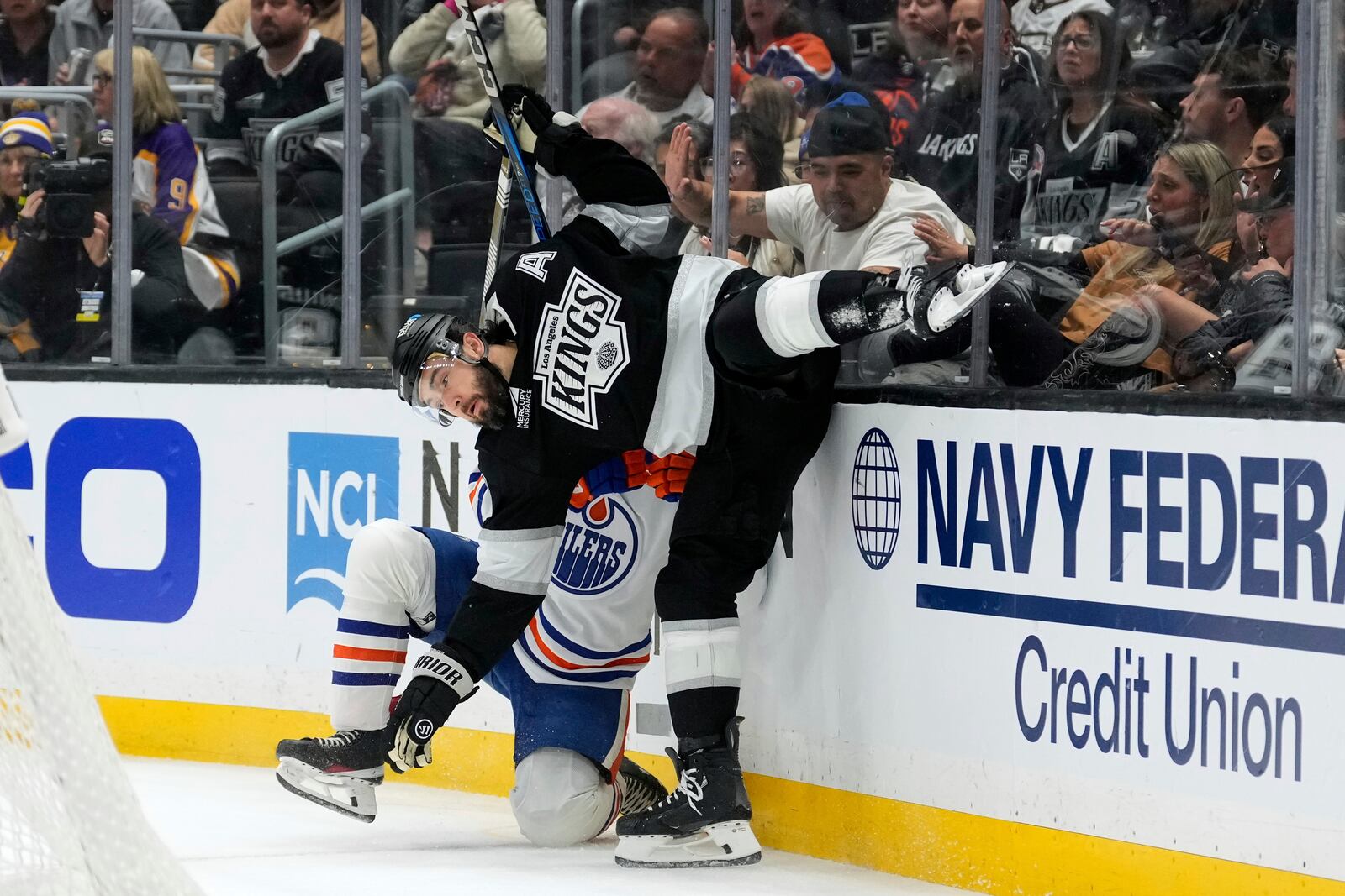 Los Angeles Kings defenseman Drew Doughty, right, collides with Edmonton Oilers right wing Vasily Podkolzin during the first period in Game 2 of an NHL hockey first-round playoff series Wednesday, April 23, 2025, in Los Angeles. (AP Photo/Mark J. Terrill)