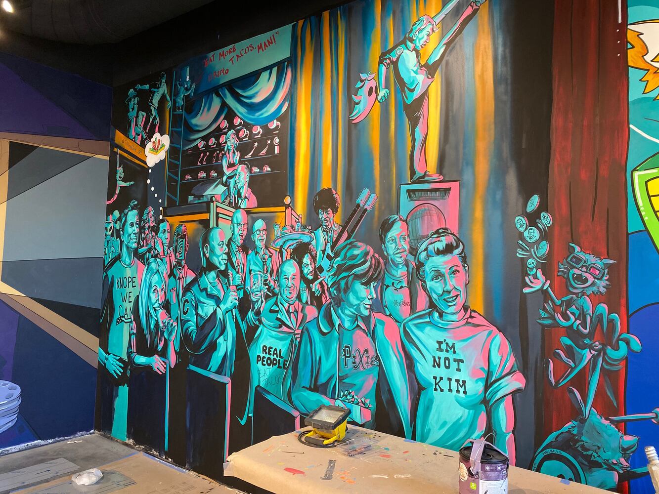 PHOTOS: Wild and wacky murals take over new restaurant at The Greene