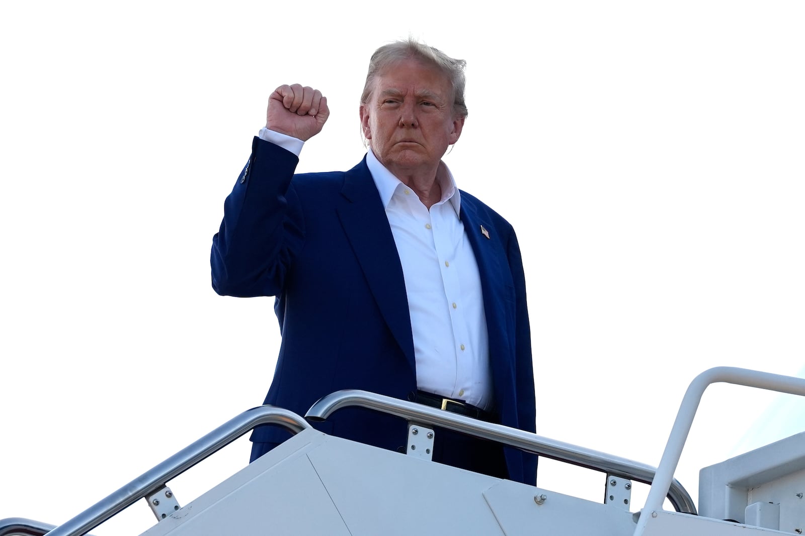 President Donald Trump boards Air Force One, Tuesday, June 24, 2025, at Joint Base Andrews, Md. (AP Photo/Alex Brandon)
