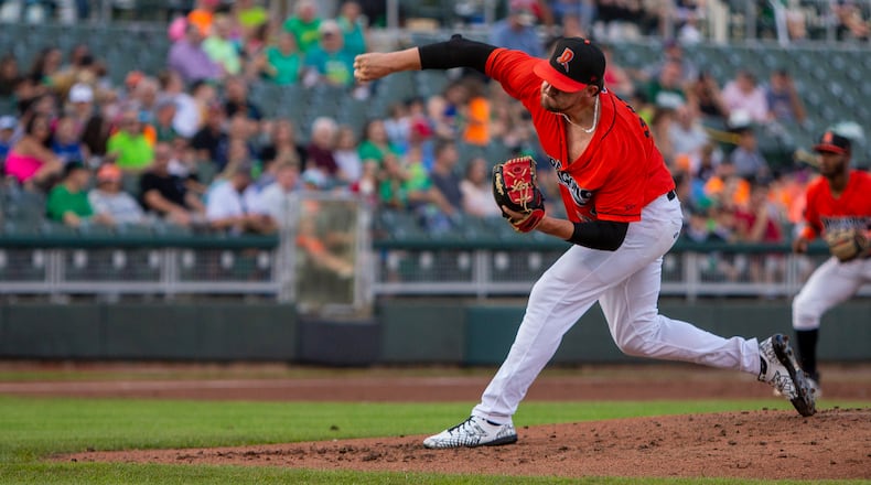 Dragons starter Graham Ashcraft fires a second-inning pitch during Friday night's game against Great Lakes at Day Air Ballpark. He pitched six scoreless innings, allowed two hits, walked two and struck out 10. Jeff Gilbert/CONTRIBUTED