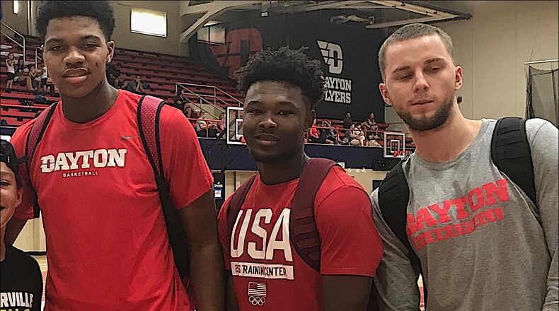 Dayton freshmen (from left to right) Obadiah Toppin, Jalen Crutcher, Jordan Pierce, Jordan Davis and Matej Svoboda pose with Chris King at a basketball camp on July 20, 2017, at UD's Frericks Center. Photo courtesy of Chris King