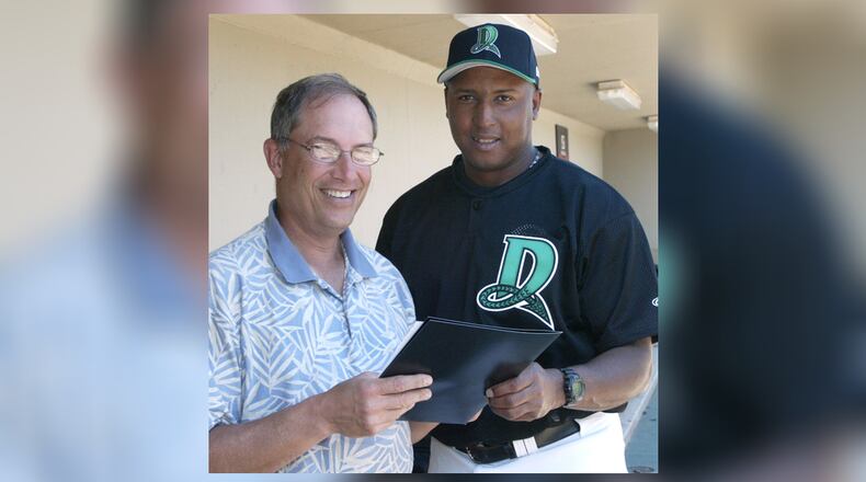 Marc Katz (left) and Alonzo Powell, the manager of the Dayton Dragons, during the 2005 season. DDN FILE PHOTO