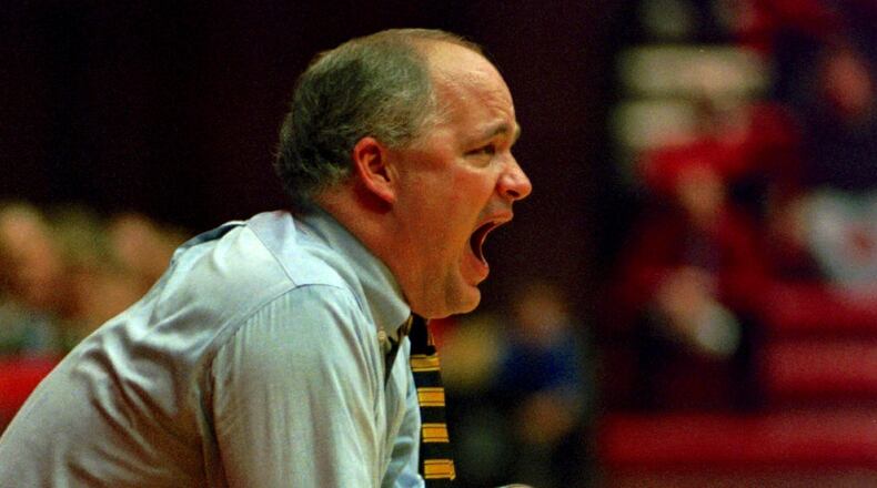 Akron Coach Dan Hipsher yells at his players in the 1st half of their game with Miami, in Oxford, Ohio, Saturday Jan. 4, 1996. (AP Photo/Tom Uhlman)