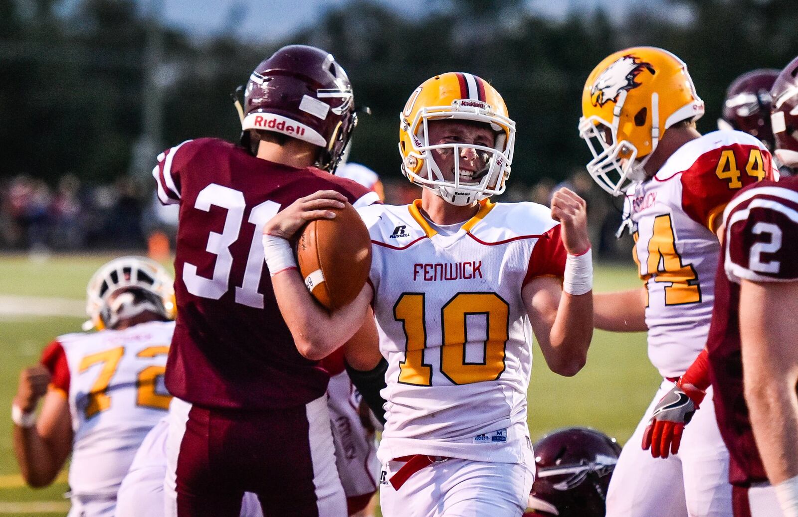 Fenwick quarterback Sully Janeck celebrates a touchdown during Friday night’s game against Lebanon at VanDeGrift Stadium in Lebanon. NICK GRAHAM/STAFF