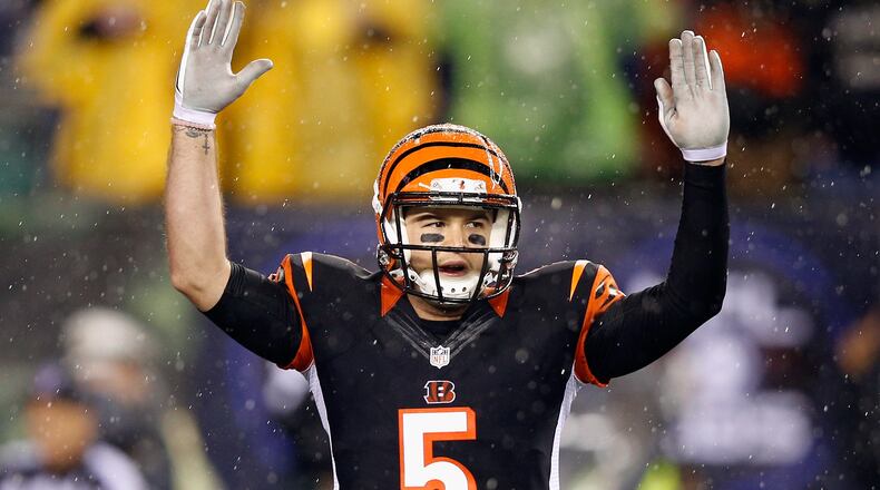 CINCINNATI, OH - JANUARY 09:  AJ McCarron #5 of the Cincinnati Bengals celebrates after Jeremy Hill #32 (not pictured) scores a touchdown in the fourth quarter against the Pittsburgh Steelers during the AFC Wild Card Playoff game at Paul Brown Stadium on January 9, 2016 in Cincinnati, Ohio.  (Photo by Joe Robbins/Getty Images)