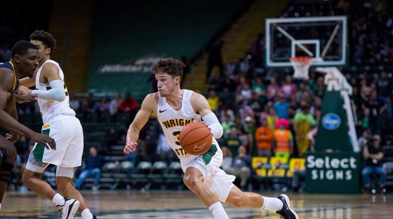 Wright State point guard Cole Gentry pushes the ball up court against Kent State on Nov. 16, 2019, at the Nutter Center. Joseph Craven/WSU Athletics