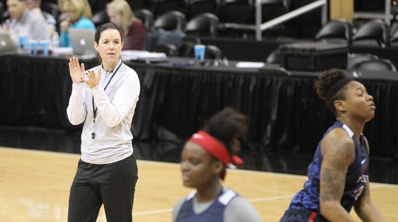 Dayton coach Shauna Green watches the team practice before the first round of the NCAA tournament on Thursday, March 15, 2018, at KFC Yum! Center in Louisville, Ky. David Jablonski/Staff