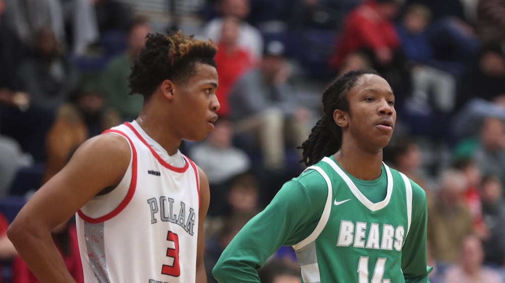 Northridge's Keonte Smith, left, and Dayton recruit Julian Washington, of Margaretta, wait for a free throw attempt at the Beacon Orthopaedics Flyin’ To The Hoop on Monday, Jan. 19, 2026, at Trent Arena in Kettering. David Jablonski/Staff