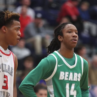 Northridge's Keonte Smith, left, and Dayton recruit Julian Washington, of Margaretta, wait for a free throw attempt at the Beacon Orthopaedics Flyin’ To The Hoop on Monday, Jan. 19, 2026, at Trent Arena in Kettering. David Jablonski/Staff
