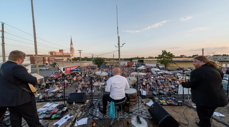 Come Together, a rooftop tribute to The Beatles performed by musicians in Dayton area bands, returns Aug. 18-19 at Yellow Cab Tavern in downtown Dayton. TOM GILLIAM / CONTRIBUTING PHOTOGRAPHER