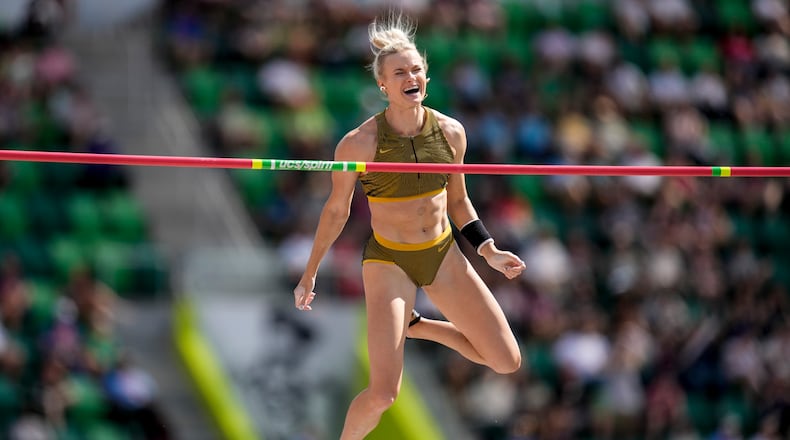 Katie Moon reacts after clearing the bar as she competes in the women's pole vault final during the U.S. Track and Field Olympic Team Trials, Sunday, June 30, 2024, in Eugene, Ore. (AP Photo/Charlie Neibergall)