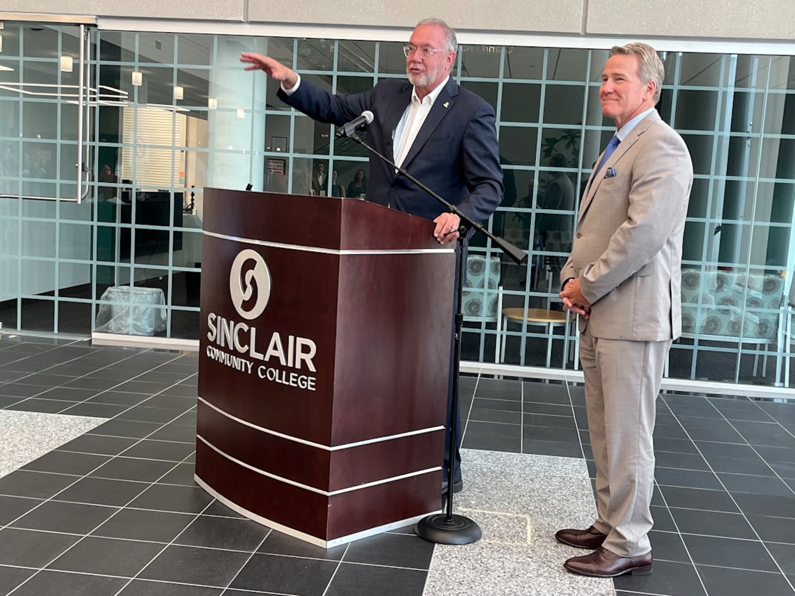 Steven Johnson, president of Sinclair Community College, left, and Sen. Jon Husted after touring some of Sinclair health education programs Wednesday Aug. 13, 2025. THOMAS GNAU/STAFF