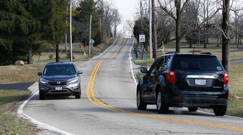 This section of Belvo Road in Miami Twp. is among about 18.3 miles of roadway Montgomery County will begin resurfacing in May. CHRIS STEWART / STAFF