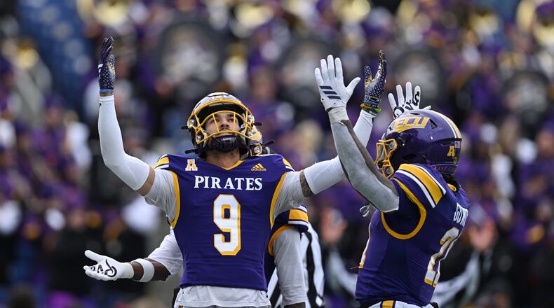 East Carolina wide receiver Anthony Smith (9) reacts after scoring a touchdown against Pittsburgh during the second half of the Military Bowl NCAA college football game, Saturday, Dec. 27, 2025, in Annapolis, Md. (AP Photo/Gail Burton)