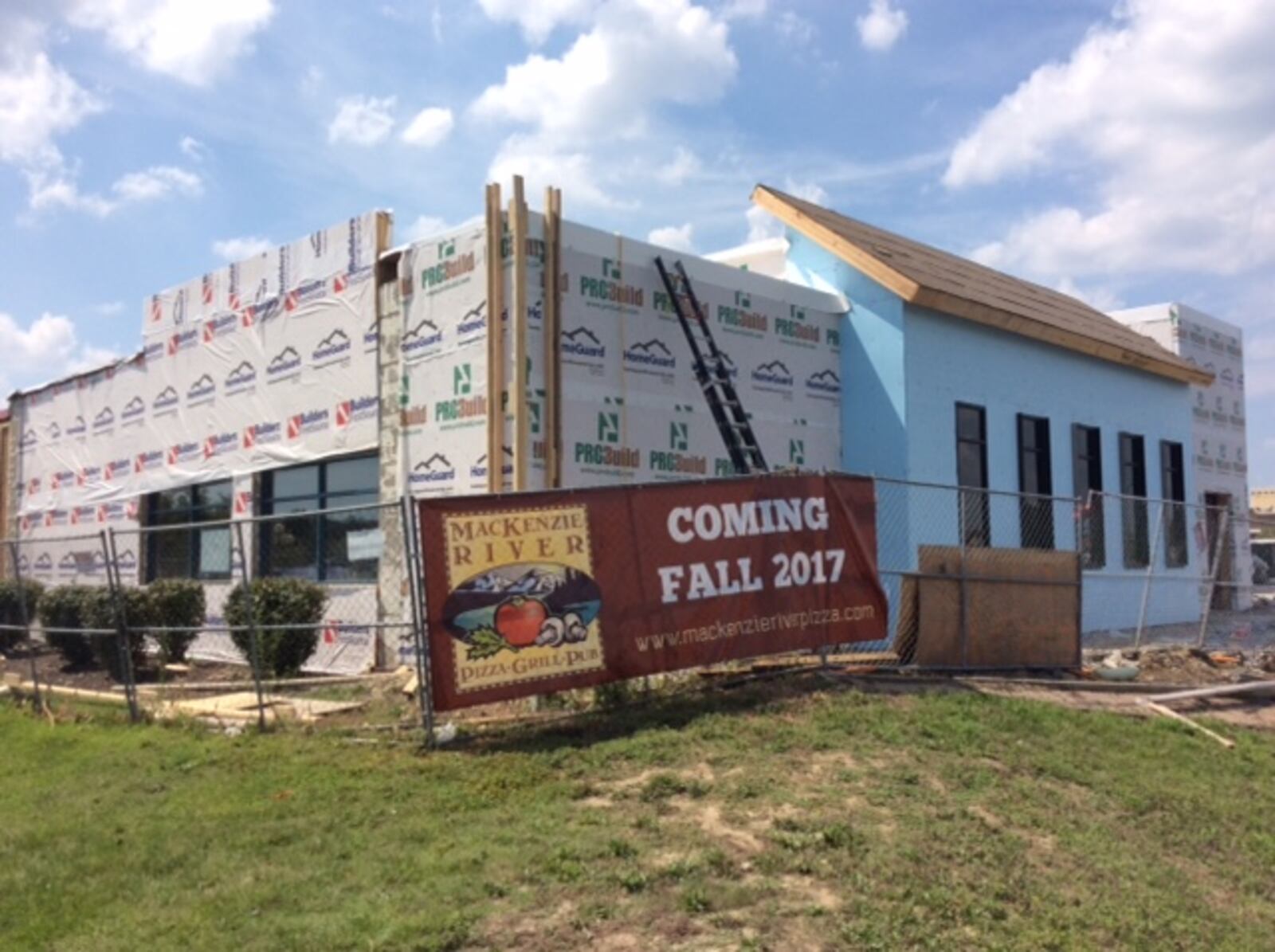 MacKenzie River Pizza, Grill & Pub is under construction in the former Max & Erma’s space in front of the Mall at Fairfield Commons. MARK FISHER/STAFF