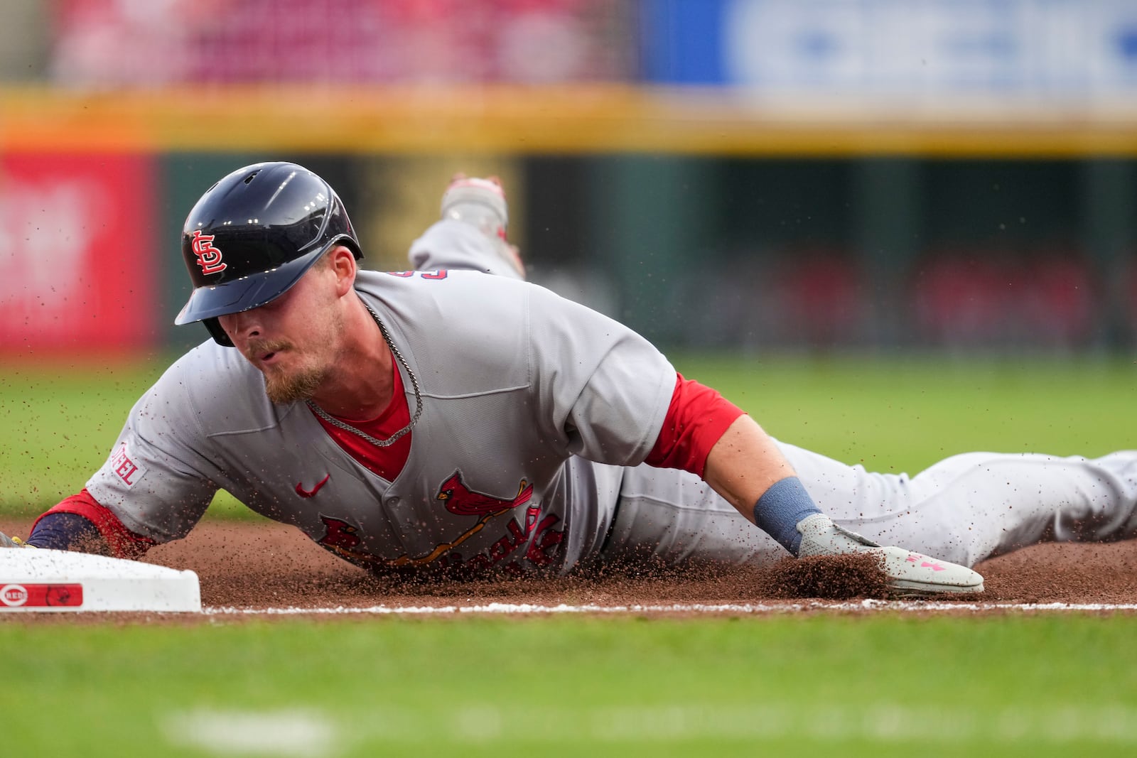 St. Louis Cardinals' Nolan Gorman reaches third base on a double hit by Jordan Walker during the third inning of the second baseball game of a doubleheader against the Cincinnati Reds Wednesday, April 30, 2025, in Cincinnati. (AP Photo/Jeff Dean)