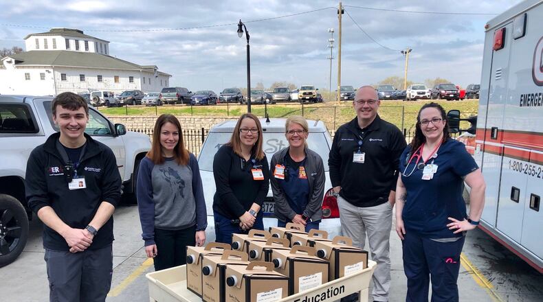 Premiere Health workers enjoy a delivery from “Pay it forward: Joe to Go and Desserts for our front line workers”. CONTRIBUTED