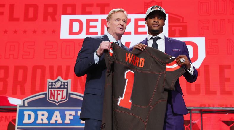 ARLINGTON, TX - APRIL 26:  Denzel Ward of Ohio State poses with NFL Commissioner Roger Goodell after being picked #4 overall by the Cleveland Browns during the first round of the 2018 NFL Draft at AT&T Stadium on April 26, 2018 in Arlington, Texas.  (Photo by Tom Pennington/Getty Images)