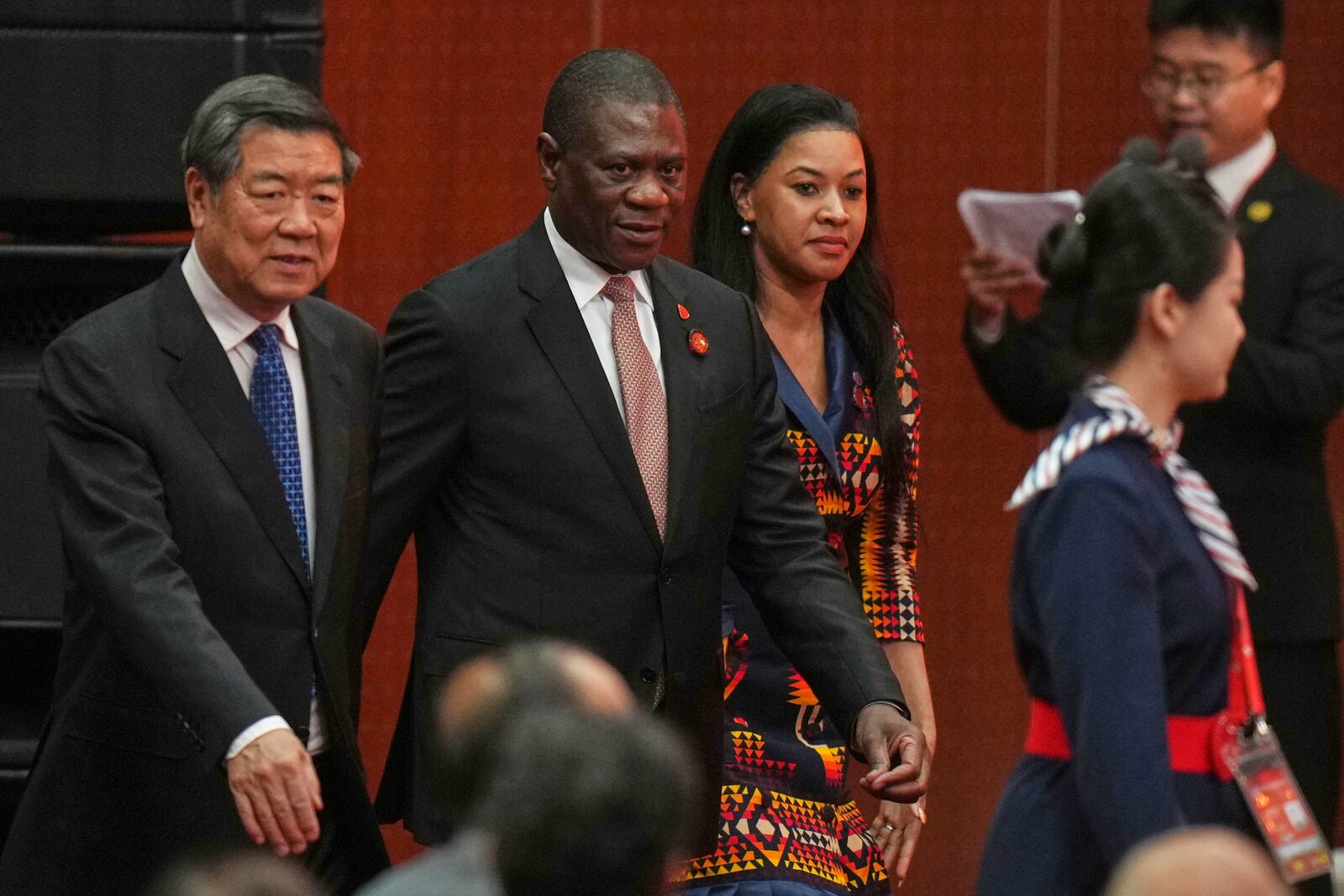 South African Deputy President Paul Mashatile, center, and Chinese Vice Premier He Lifeng, left, arrive to the opening ceremony of the 3rd China International Supply Chain Expo at the China International Exhibition Center, in Beijing, Wednesday, July 16, 2025. (AP Photo/Andy Wong)