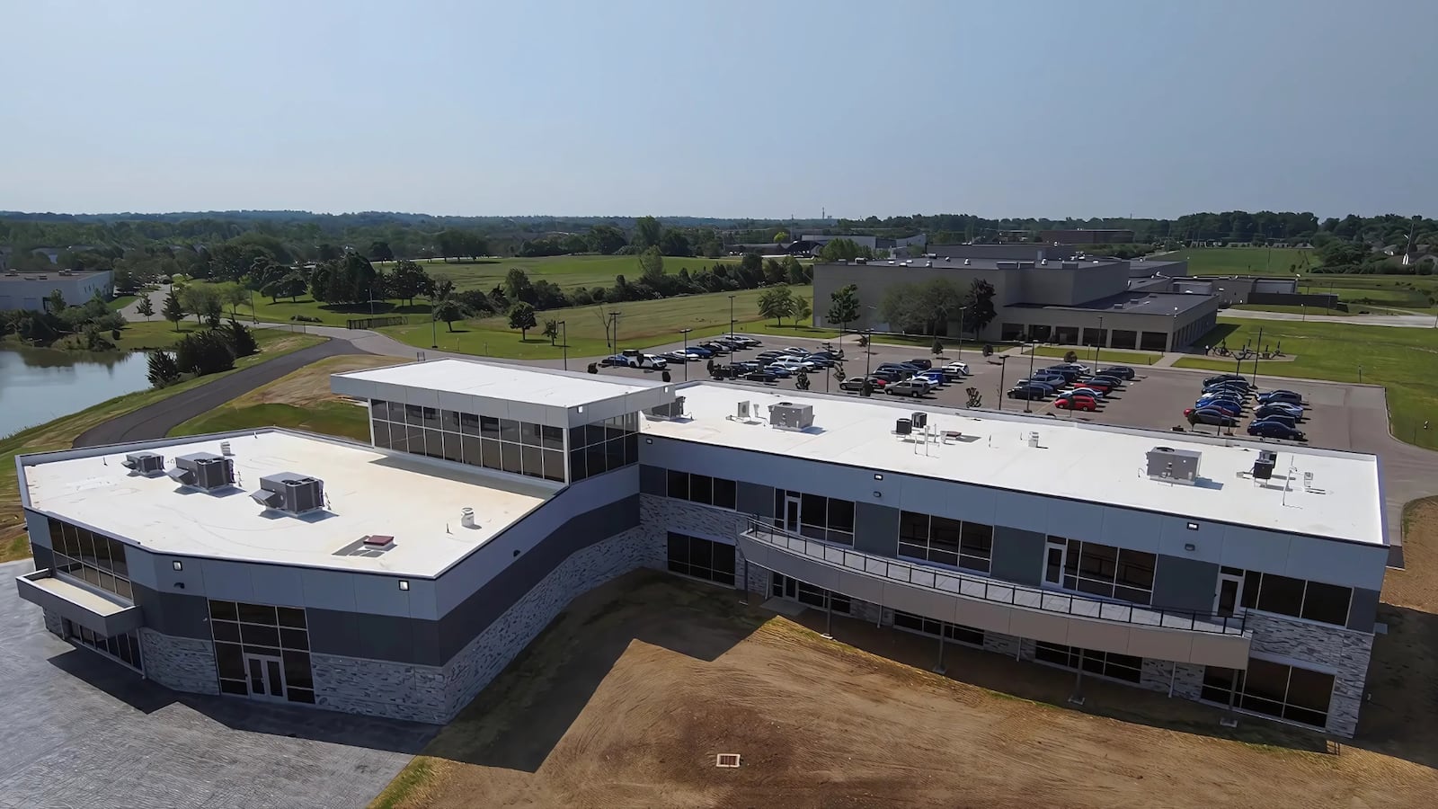 CRG Defense opened its new headquarters Wednesday, July 16, in Miami Twp. The two-story, 25,763-square-foot facility at 8789 Washington Church Road features 19,673 square feet of office space and 6,090 square feet dedicated to community use. CONTRIBUTED