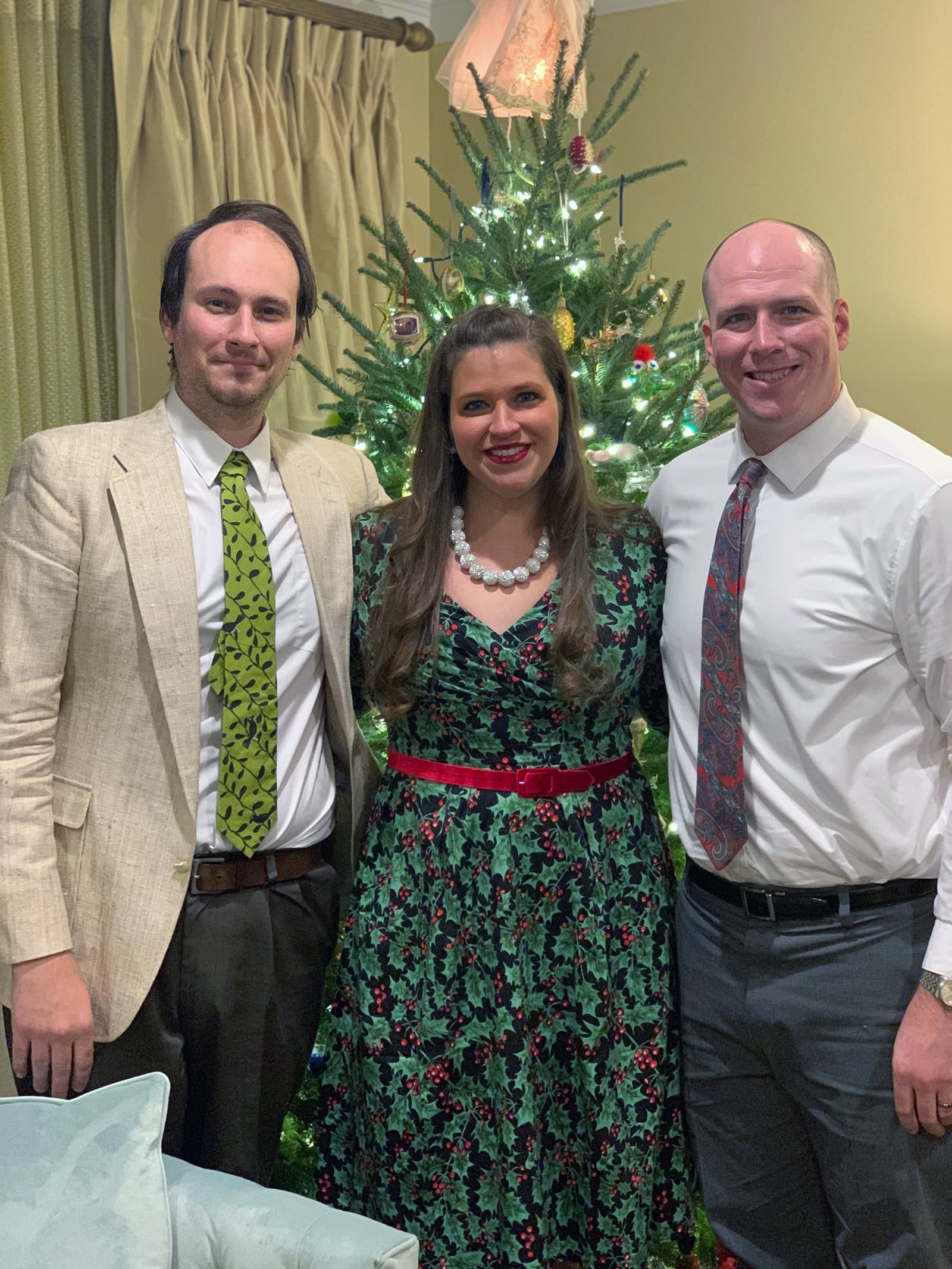 Abigael Kasza, center, with her brothers Frank Kassell, left, and David Kaszar, right, at Christmas 2019. CONTRIBUTED