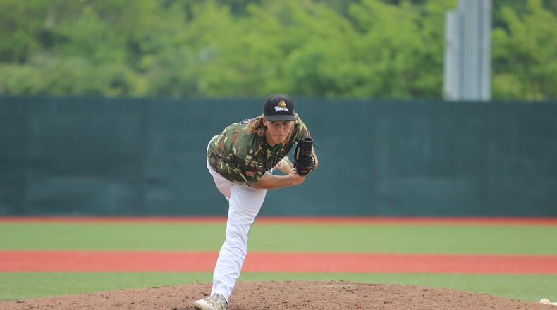 Wright State’s Caleb Sampen throws to the plate in Saturday’s 7-2 win over Valpo in the Horizon League championship game. The freshman threw a complete game and was named to the all-tournament team. Mike Hartsock/WHIO-TV