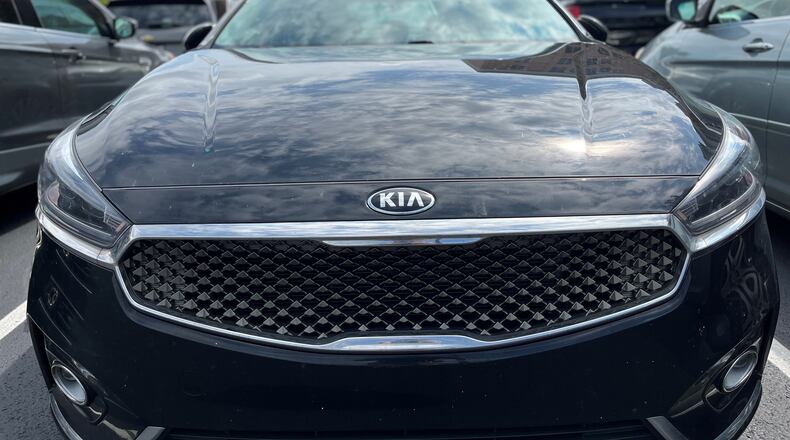 A Kia parked in a parking lot in Dayton. CORNELIUS FROLIK / STAFF