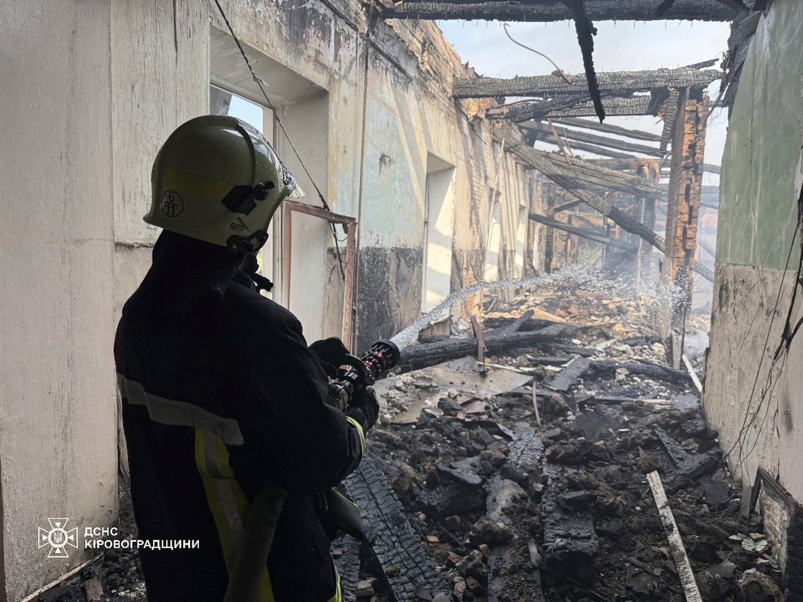 In this photo provided by the Ukrainian Emergency Service, firefighters put out the fire in a fire department school following a Russian air attack in Kropyvnytskyi, Ukraine, Monday, July 28, 2025. (Ukrainian Emergency Service via AP)
