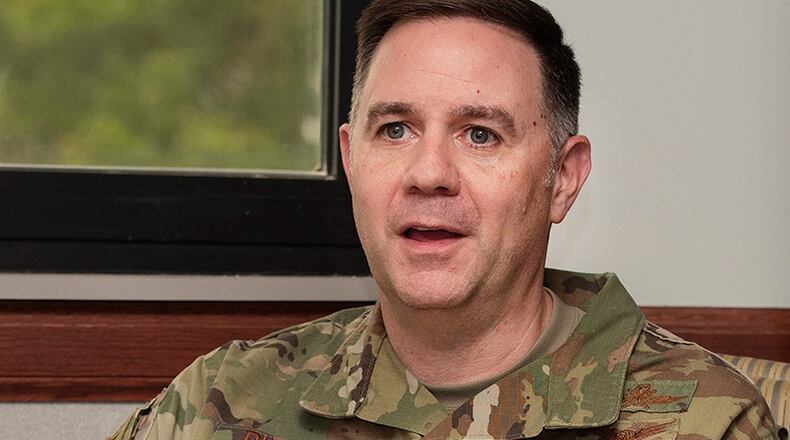 Col. Michael Phillips, 88th Air Base Wing vice commander, talks with a reporter in his office June 24 at Wright-Patterson Air Force Base. Phillips was wrapping up a 2-year tour as the vice wing commander before transferring down the street to the Air Force Materiel Command headquarters. U.S. AIR FORCE PHOTO/R.J. ORIEZ
