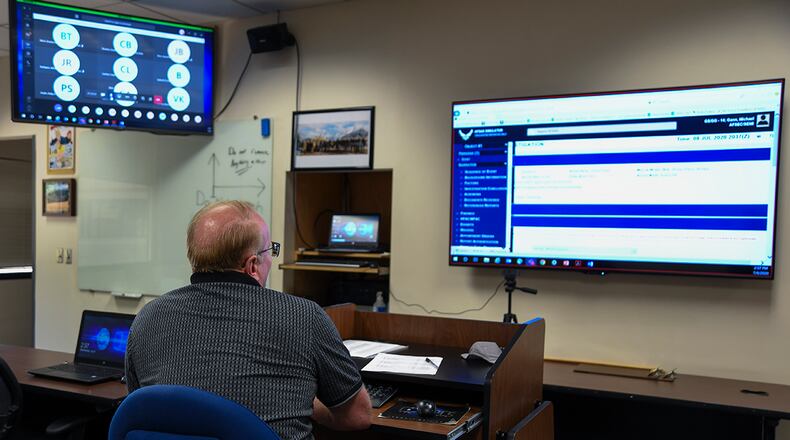 Michael Gann, chief of the Air Force Safety Center's Training Instruction Branch, teaches virtually at the center July 9, Kirtland Air Force Base, N.M. On March 13, AFSEC canceled all in-residence courses until at least September due to the ongoing global pandemic. AFSEC staff have made the switch to teaching all virtually since the end of March. (U.S. Air Force photo/Jessie Perkins)