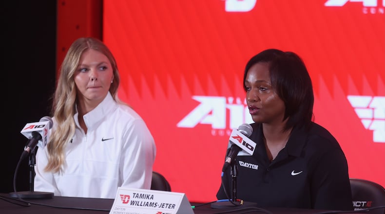 Dayton's Tamika Williams-Jeter, right, and Ivy Wolf talk at a press conference during Atlantic 10 Conference Media Day on Monday, Oct. 7, 2024, at District E next to Capital One Arena in Washington, D.C. David Jablonski/Staff