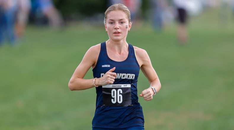 Oakwood High School senior Riley Meador competes in the Division III district cross country meet held Saturday, Oct. 18 at Cedarville University. MICHAEL COOPER / STAFF