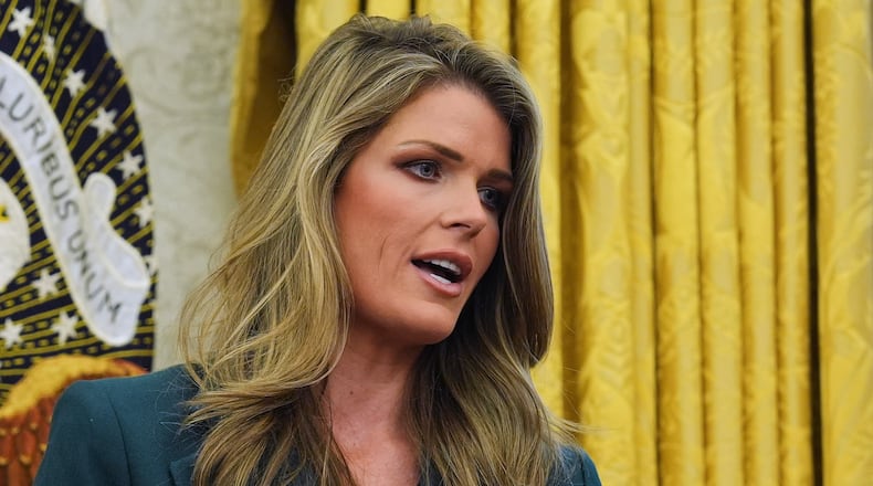FILE - Lindsey Halligan speaks as President Donald Trump signs executive orders in the Oval Office of the White House, Friday, Jan. 31, 2025, in Washington. (AP Photo/Evan Vucci, File)