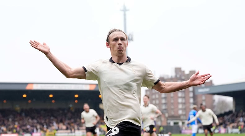 Port Vale's Ben Waine celebrates after scoring his side's first goal of the game during the FA Cup fifth round soccer match between Sunderland and Port Vale, in Stoke on Trent, England, Sunday March 8, 2026. (Nick Potts/PA via AP)