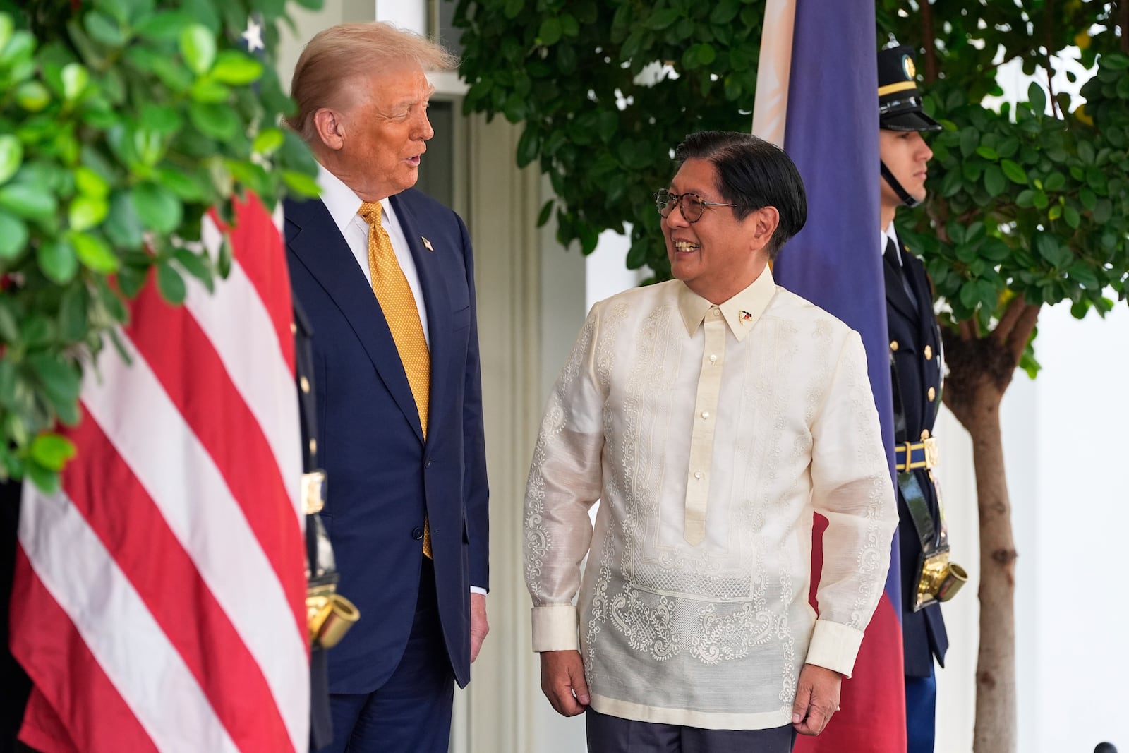 President Donald Trump greets Philippine President Ferdinand Marcos Jr., upon arrival at the White House, Tuesday, July 22, 2025, in Washington. (AP Photo/Alex Brandon)