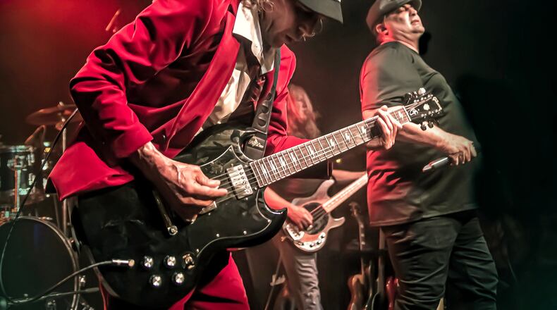 The energy of the driving rock of AC/DC will be recreated live by tribute band Big Gun with guitarist Scott Abney and vocalist Andy Bowman at the State Theater on Saturday, July 19.