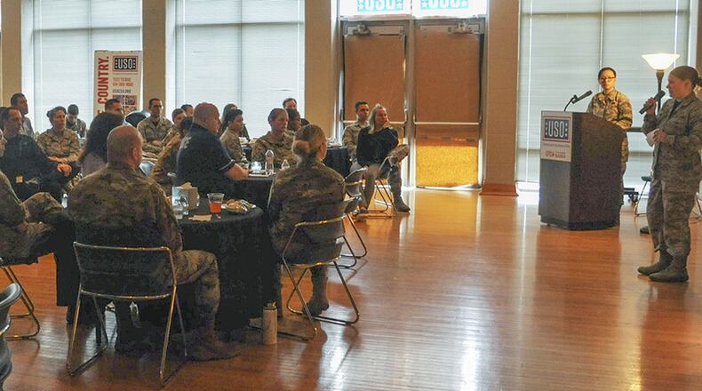 Staff Sgt. Victoria Rhodes, medical technician, shares her story of surviving severe burns during the annual Storytellers event March 29 at Wright-Patterson Air Force Base. The event allowed attendees to hear the stories of 4 Airmen who have overcome adversity in the military. (U.S. Air Force photo/Senior Airman Holly Ardern)