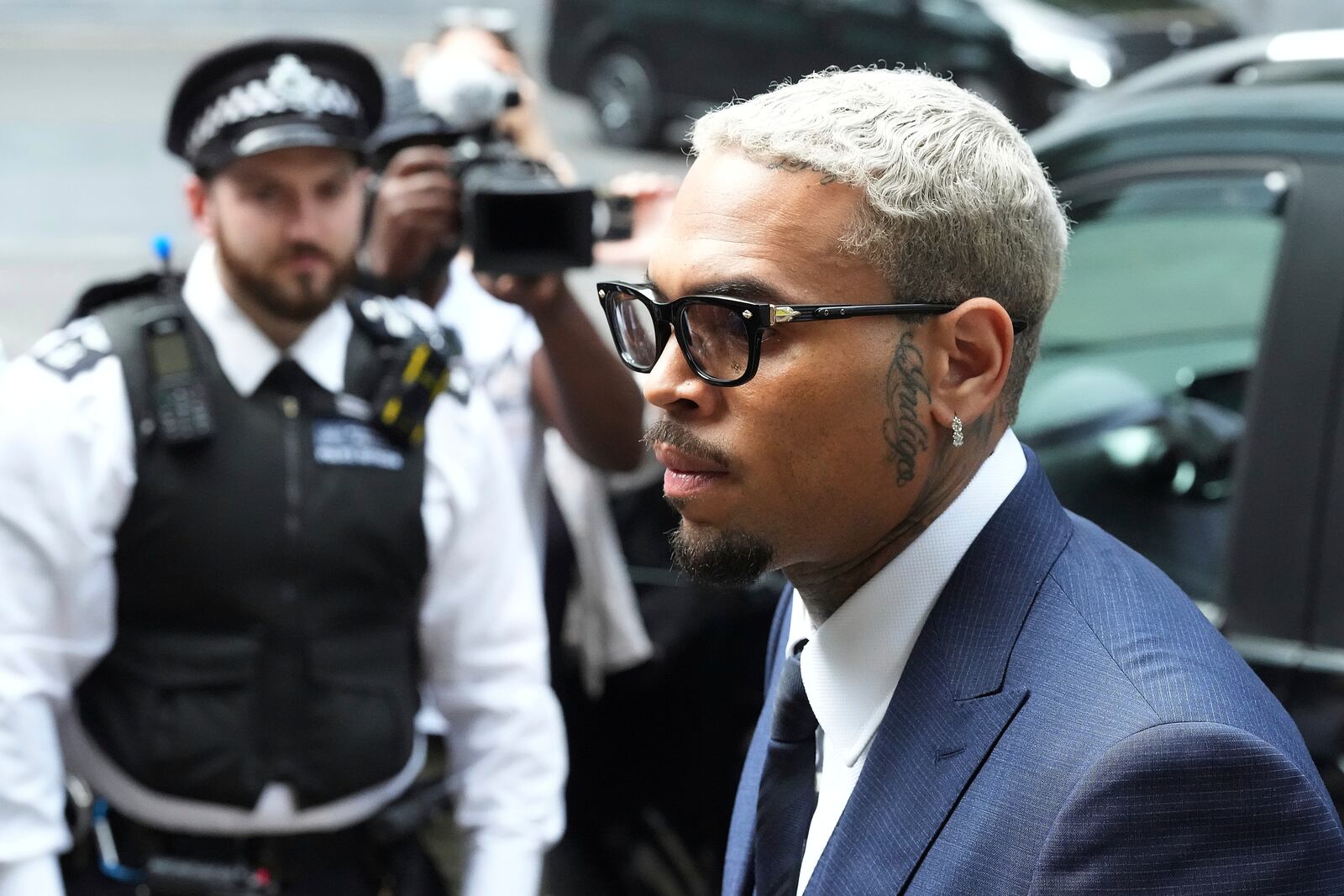R&B singer Chris Brown arrives at Southwark Crown Court to attend a plea hearing in London, Friday, June 20, 2025.(AP Photo/Frank Augstein)