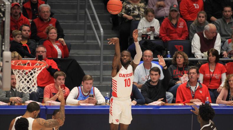 Dayton’s Jalen Crutcher shoots against St. Bonaventure on Wednesday, Jan. 22, 2020, at UD Arena. David Jablonski/Staff