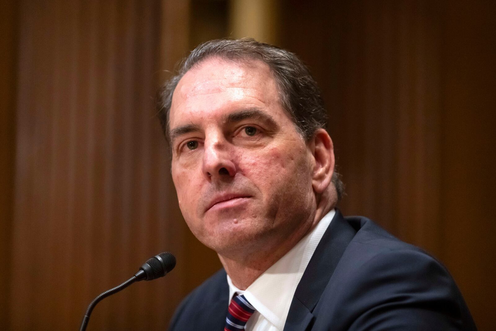 FILE - Michael Faulkender, President Donald Trump's pick to be Deputy Secretary of the Treasury, listens during a hearing of the Senate Committee on Finance on Capitol Hill, March 6, 2025, in Washington. (AP Photo/Mark Schiefelbein, File)