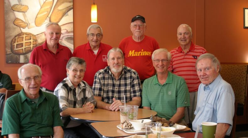 Retired U.D. math professors meet at Panera Bread on Brown Street to reminisce. Seated (from left): Harry Mushenheim, Carroll Schleppi, John Kauflin, Les Steinlage, and Jack McCloskey.Standing (from left): Ralph Steinlage, Dick Peterson, Jerry Strange and Ben Rice. PAMELA DILLON/CONTRIBUTED