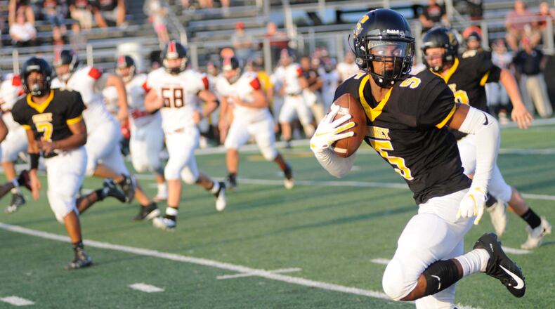Sidney’s Josiah Hudgins returns an interception. MARC PENDLETON / STAFF