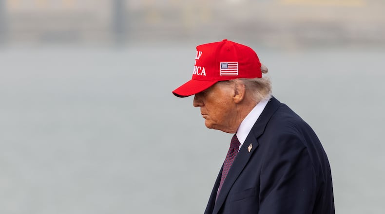 President Donald Trump leaves the stage after speaking at the Port of Corpus Christi in Corpus Christi, Texas, Friday, Feb. 27, 2026. (AP Photo/Michael Gonzalez)